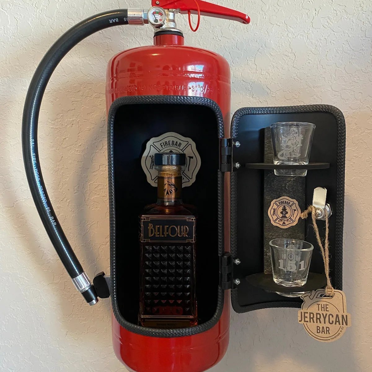 Closed red fire extinguisher mini bar cabinet mounted on a wall